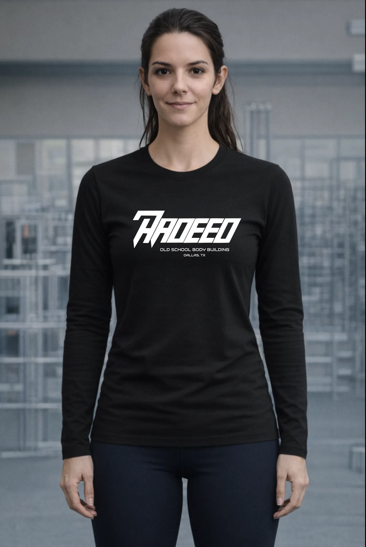 Iron Core Long Sleeves in black, worn by a woman on the gym floor